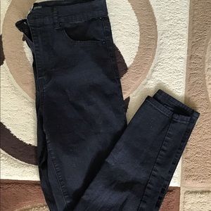 Black mid rise jeans.